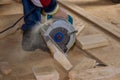 Circular saw carpenter using for wood beam Royalty Free Stock Photo