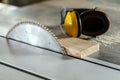 Circular saw in carpentry workshop