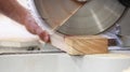 Circular saw up close cutting plank of timber Royalty Free Stock Photo