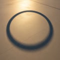 Even circle indicating a light source positioned in alignment with Royalty Free Stock Photo