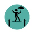 Circular silhouette with circus juggler on rope with umbrella
