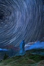 Circular star trails with the Simplon Pass Eagle at the foreground.
