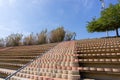 Circular stone stairs and bleachers in a park in streets of Barcelona