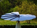 Circular sunflower shaped rotating solar panel system Royalty Free Stock Photo