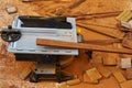 Circular table saw carpenter tool and sawdust Royalty Free Stock Photo