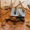 Circular table saw carpenter tool and sawdust Royalty Free Stock Photo