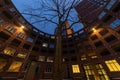 Bright brick house at the Clio place at night