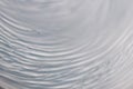 Circular wave motion in a fluid system. blue gray background for Royalty Free Stock Photo