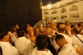 Circumambulating around the Kaaba, crowding around the Black Stone. Mecca, Saudi