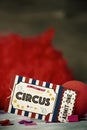 Circus admission ticket, clown nose and red wig Royalty Free Stock Photo