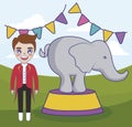 circus animal tamer male with elephant and garlands