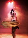 Circus artist with hula hoops Royalty Free Stock Photo