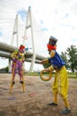 Circus clowns animators throw colored rings