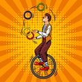 Circus juggler on unicycle pop art vector