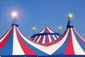 Circus tent under blue sky colorful stripes