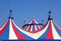 Circus tent under blue sky colorful stripes Royalty Free Stock Photo