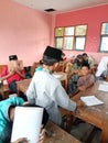 Cirebon, Indonesia - February 7 2023 : Islamic elementary school students are studying in classroom
