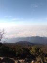The sea of clouds and hills looks very beautiful from the top of Mount Ciremai Royalty Free Stock Photo