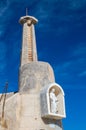 Cirkewwa, Malta - May 8, 2017: Virgin Mary at old Cirkewwa Lighthouse.