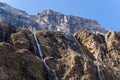 Trees hide the Chaine des Aravis in Europe, France, Rhone Alpes, Savoie, Alps, in winter on a sunny day