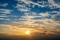 Cirrocumulus Morning sky Small and large clouds are dense with the sun below