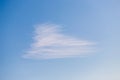 Cirrocumulus one cloud in the light blue sky background Royalty Free Stock Photo