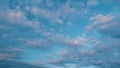 Cirrocumulus with ray light effects. Morning sunset blue sky with wispy smoke cirrocumulus.