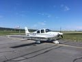 Cirrus aircraft on apron of small airport