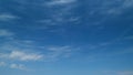 Cirrus cloud with blue sky background. Awesome white filaments of clouds and light effects. Timelapse. Royalty Free Stock Photo