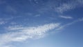 Cirrus cloud in the blue sky. High in the sky feathery clouds Royalty Free Stock Photo