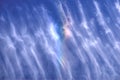 cirrus clouds form impromptu rainbow Royalty Free Stock Photo