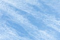 Cirrus Clouds. White cirrus clouds against the blue sky. Interesting background of blurry clouds. Royalty Free Stock Photo