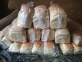 Medium pile of white bread for the whole family