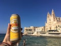 Cisk Beer and Church of Our Lady of Mount Carmel in the Evening, Saint Julian, Malta