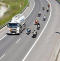 Cistern truck preceded by group of motorbikers on slovak D1 highway Royalty Free Stock Photo