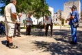 Retired people play in the square