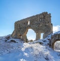 Citadel of he ancient cave city of Mangup-Kale in the snow in the backlight