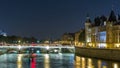 Cite island view with Conciergerie Castle and Pont au Change, over the Seine river timelapse. France, Paris Royalty Free Stock Photo