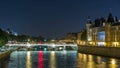 Cite island view with Conciergerie Castle and Pont au Change, over the Seine river timelapse. France, Paris Royalty Free Stock Photo