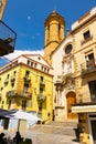 La Bisbal d'Emporda from Castilla. Imposing Romanesque construction, nearby church of Santa Maria de Bisbal. Royalty Free Stock Photo