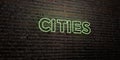 CITIES -Realistic Neon Sign on Brick Wall background - 3D rendered royalty free stock image