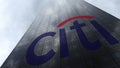 Citigroup logo on a skyscraper facade reflecting clouds. Editorial 3D rendering