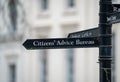 Citizens Advice Bureau Sign in English Regency town. Royalty Free Stock Photo