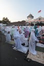 Citizens of Eid al-Adha prayers in the courtyard of the palace solo java Indonesia with his parents.