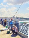 Citizens fishing on the Galata bridge. Istanbul, Turkey.