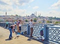 Citizens fishing on the Galata bridge. Istanbul, Turkey.