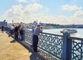 Citizens on the Galata bridge. Istanbul, Turkey. Royalty Free Stock Photo