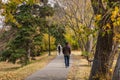 Citizens relax in the Princes Island Park in autumn. Downtown Calgary