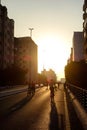 Citizens walk the viaduct Minhocao, or Elevado Presidente Joao Goulart, in Sao Paulo downtown, Brazil, on sunset