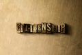 CITIZENSHIP - close-up of grungy vintage typeset word on metal backdrop